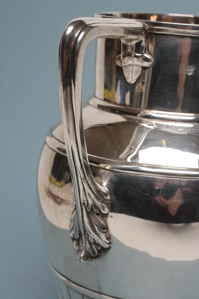 A VICTORIAN SILVER ALE JUG Image