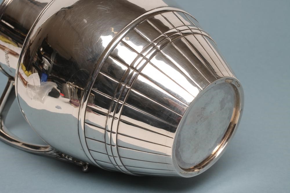 A VICTORIAN SILVER ALE JUG Image