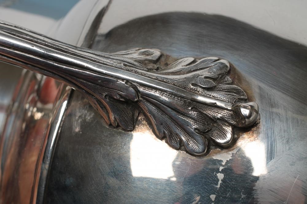 A VICTORIAN SILVER ALE JUG Image