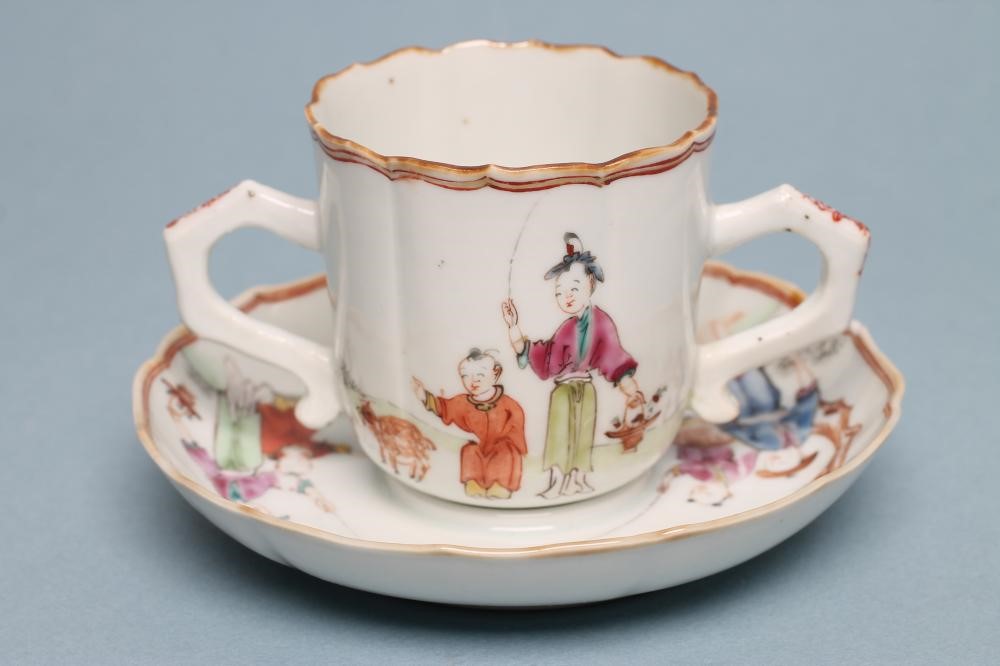 A CHINESE PORCELAIN CAUDLE CUP AND TREMBLEUSE SAUCER of lotus shape Image