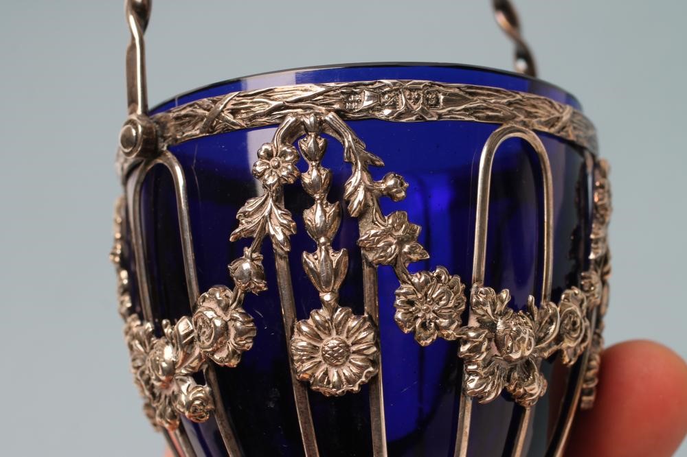 AN EDWARDIAN SILVER SUGAR BASKET Image