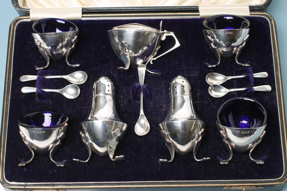 AN ARTS AND CRAFTS SILVER SEVEN PIECE CRUET Image