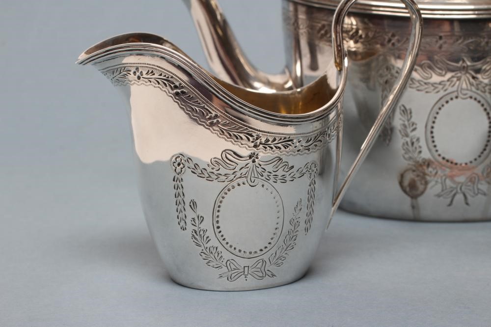 *A LATE VICTORIAN SILVER THREE PIECE TEA SERVICE Image