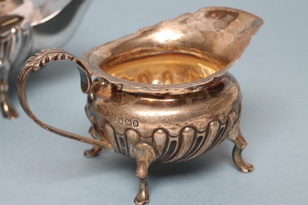 *A LATE VICTORIAN BACHELOR'S SILVER THREE PIECE TEA SERVICE Image