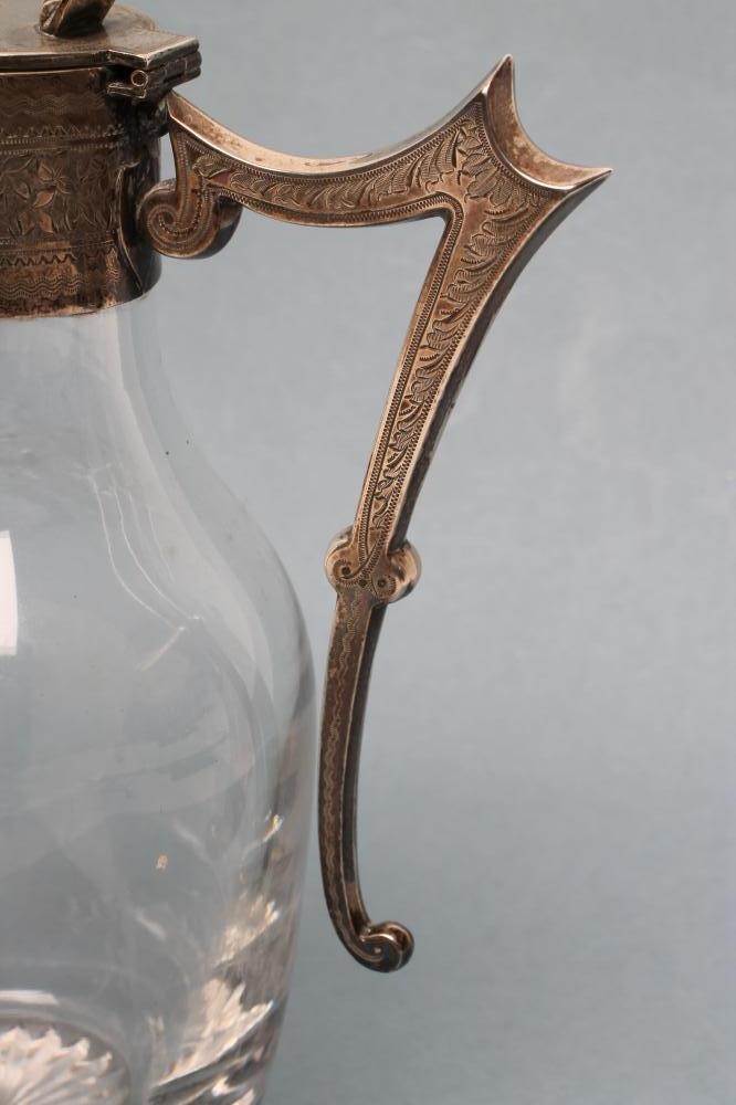 A LATE VICTORIAN SILVER MOUNTED PORT EWER Image