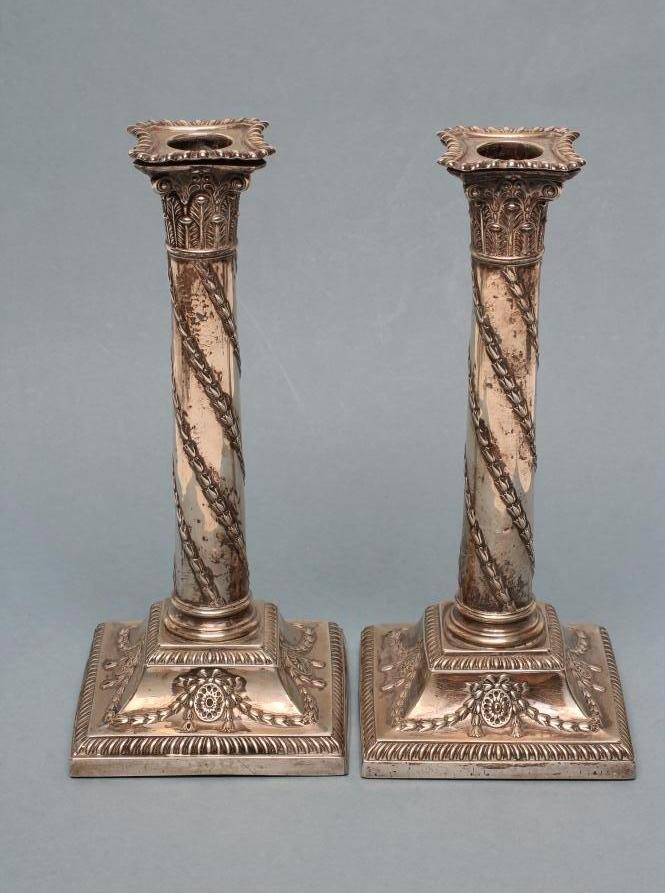 A PAIR OF LATE VICTORIAN SILVER CORINTHIAN COLUMN CANDLESTICKS Image