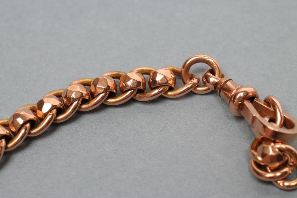 AN ALBERT CHAIN with faceted alternate links and two dog-clip fasteners and bar Image