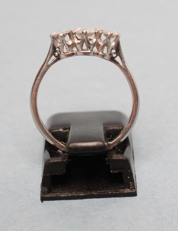 A THREE STONE DIAMOND RING Image