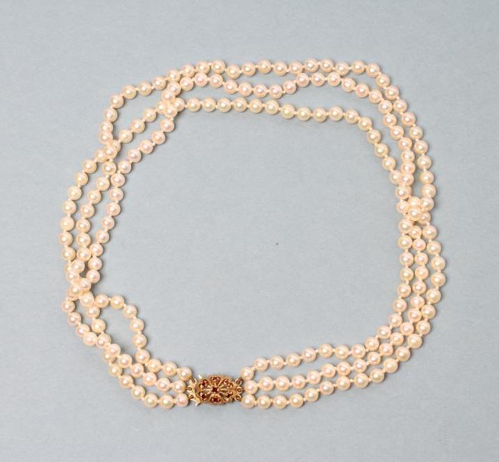 A CULTURED PEARL TRIPLE STRAND NECKLACE Image