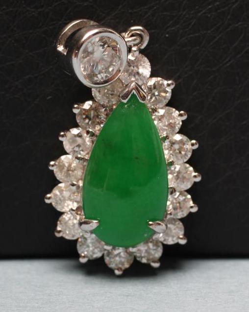 A JADE AND DIAMOND PENDANT Image