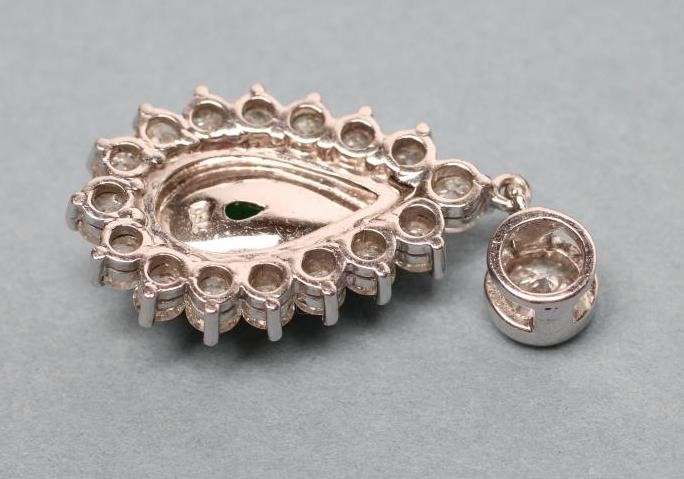 A JADE AND DIAMOND PENDANT Image