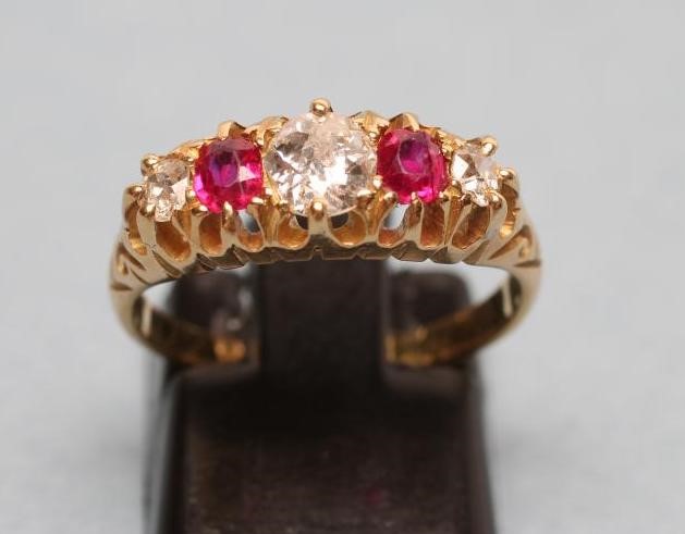 AN EDWARDIAN FIVE STONE RUBY AND DIAMOND RING Image