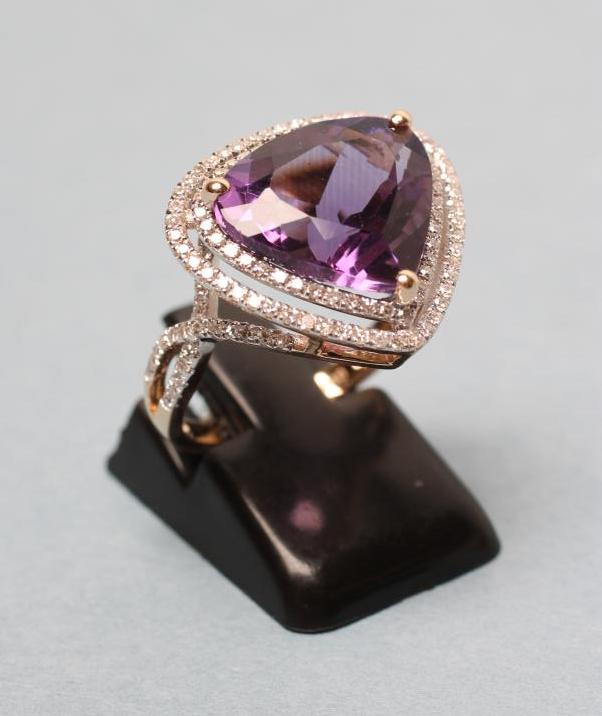 AN AMETHYST AND DIAMOND DRESS RING Image