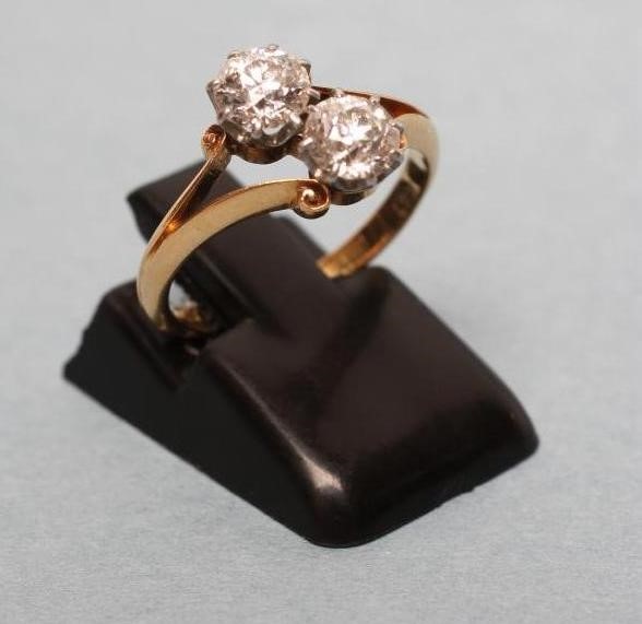 A TWO STONE DIAMOND CROSSOVER RING Image