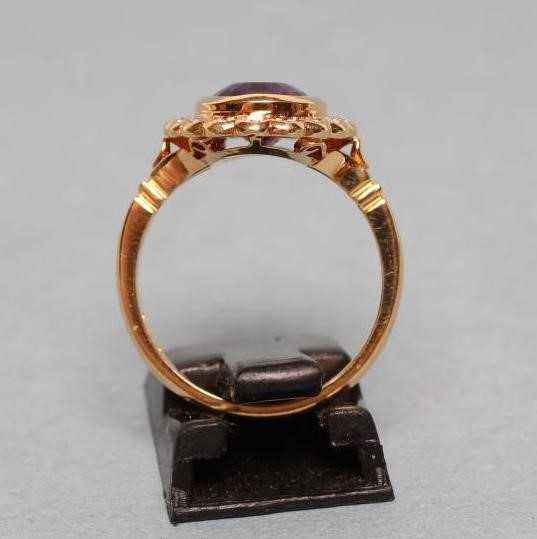 AN AMETHYST AND DIAMOND CLUSTER RING Image