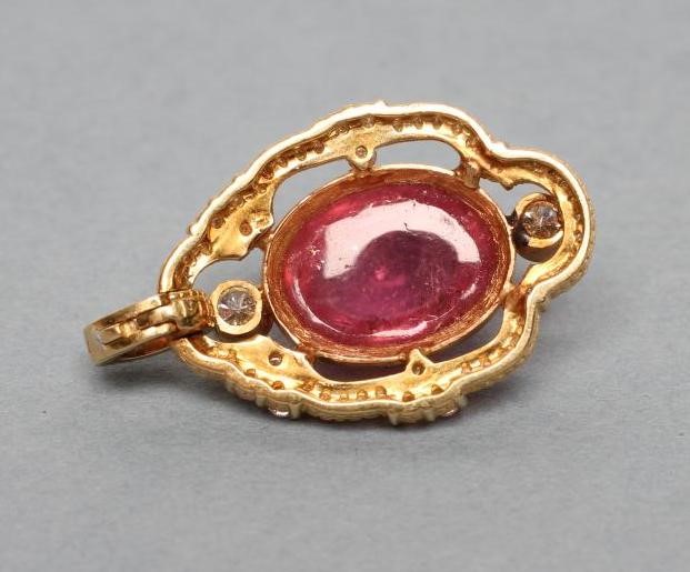 A PINK TOURMALINE AND DIAMOND PENDANT Image