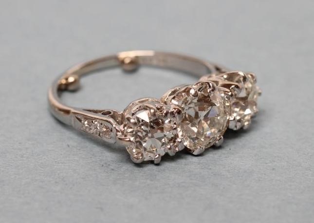 A THREE STONE DIAMOND RING Image