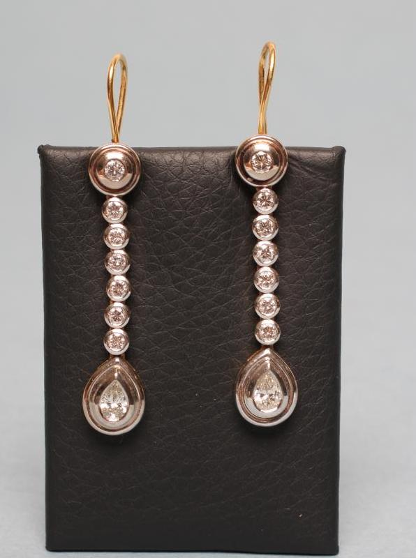 A PAIR OF DIAMOND DROP EARRINGS Image