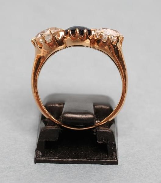 A LATE VICTORIAN SAPPHIRE AND DIAMOND THREE STONE RING Image