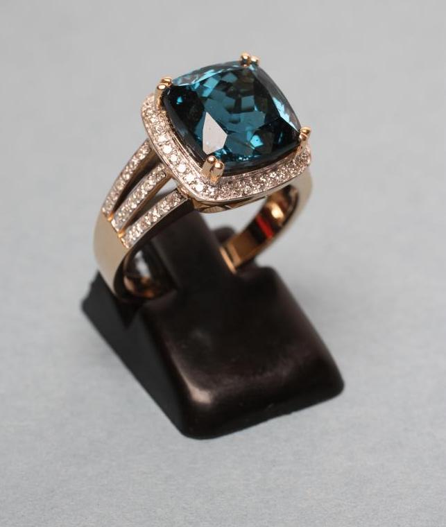 A BLUE TOPAZ AND DIAMOND DRESS RING Image