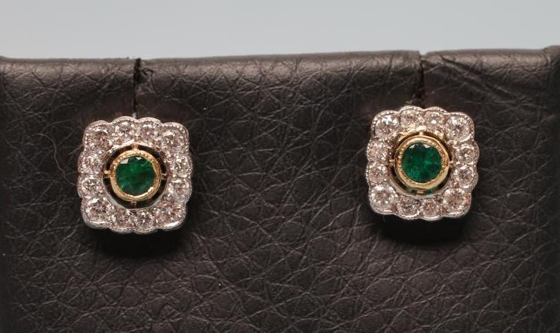 A PAIR OF EMERALD AND DIAMOND SQUARE CLUSTER EAR STUDS Image