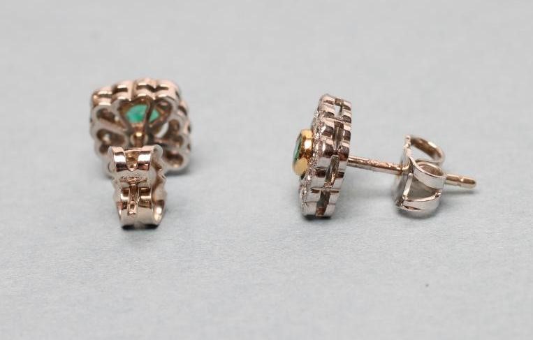 A PAIR OF EMERALD AND DIAMOND SQUARE CLUSTER EAR STUDS Image