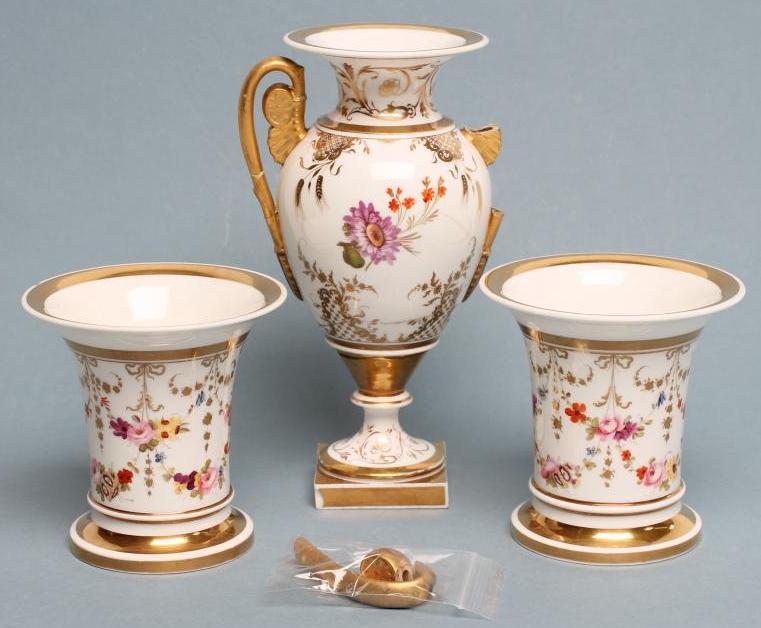 A ROCKINGHAM PORCELAIN MATCHED THREE PIECE GARNITURE Image