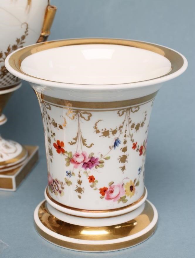 A ROCKINGHAM PORCELAIN MATCHED THREE PIECE GARNITURE Image