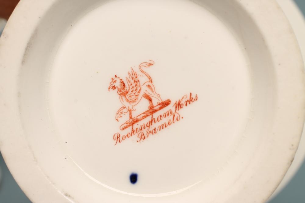 A ROCKINGHAM PORCELAIN MATCHED THREE PIECE GARNITURE Image