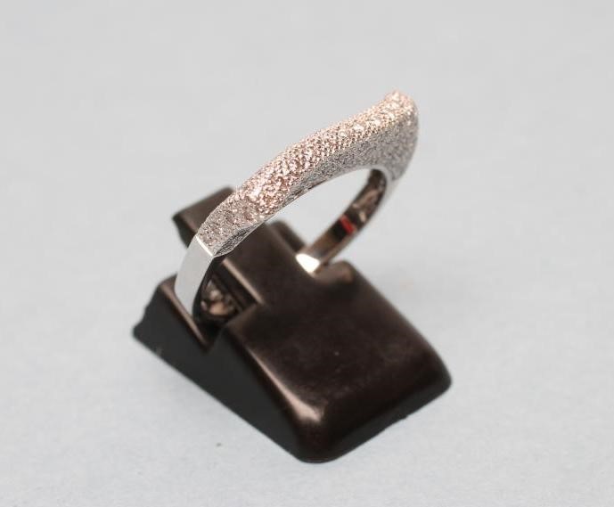 A DIAMOND DRESS RING Image