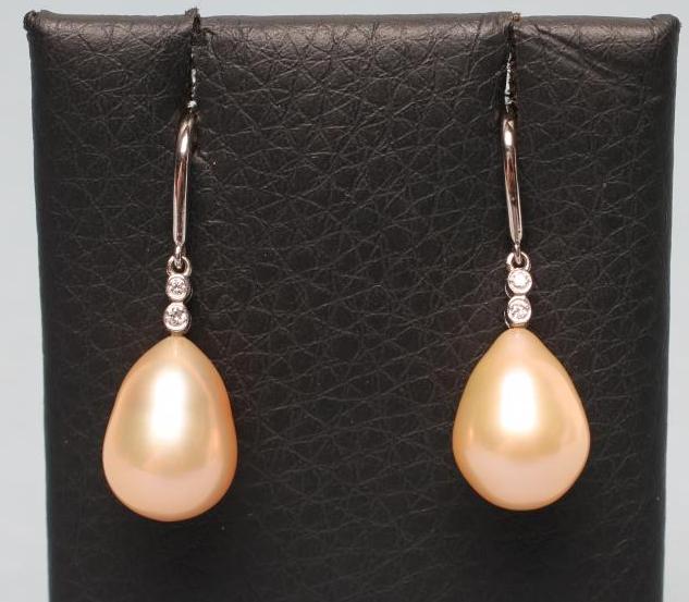 A PAIR OF PEARL AND DIAMOND DROP EARRINGS Image