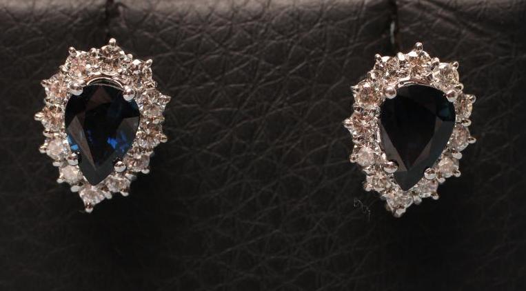 A PAIR OF SAPPHIRE AND DIAMOND CLUSTER EAR STUDS Image