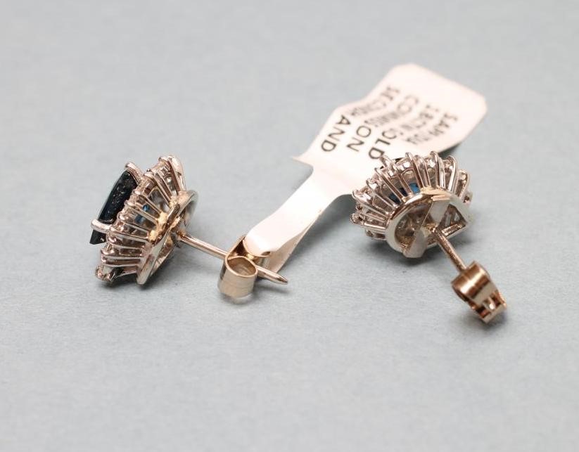 A PAIR OF SAPPHIRE AND DIAMOND CLUSTER EAR STUDS Image
