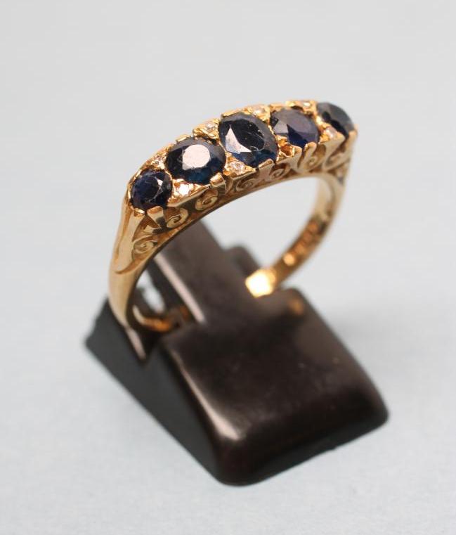 A FIVE STONE SAPPHIRE RING Image