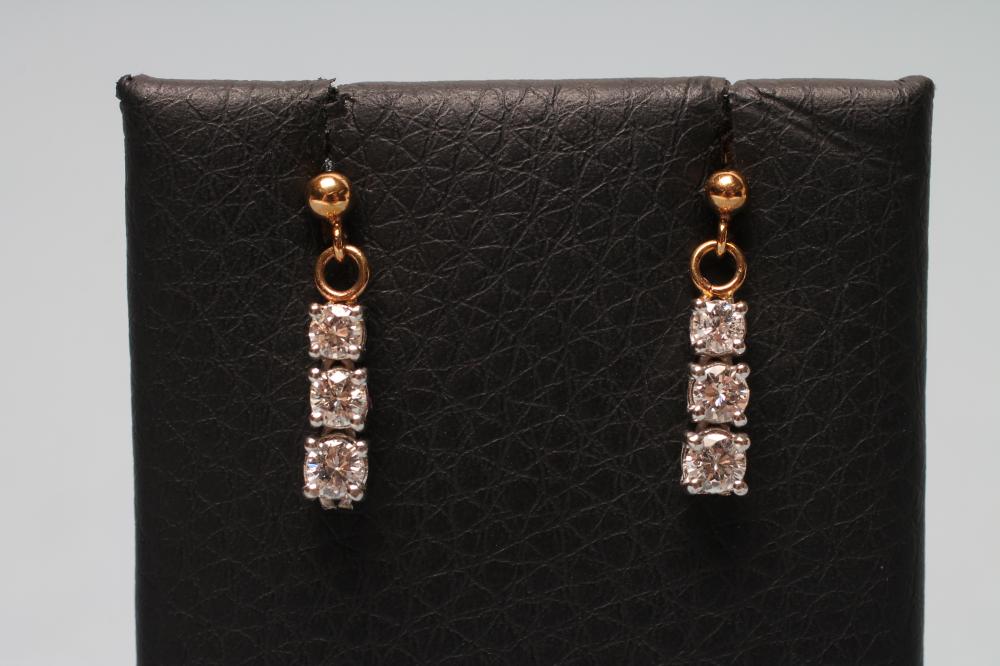A PAIR OF DIAMOND DROP EARRINGS Image