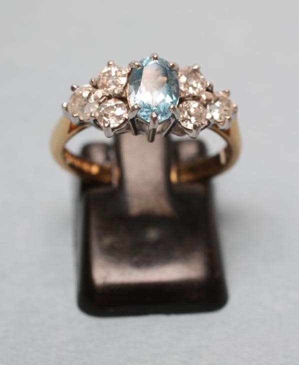 AN AQUAMARINE AND DIAMOND DRESS RING Image