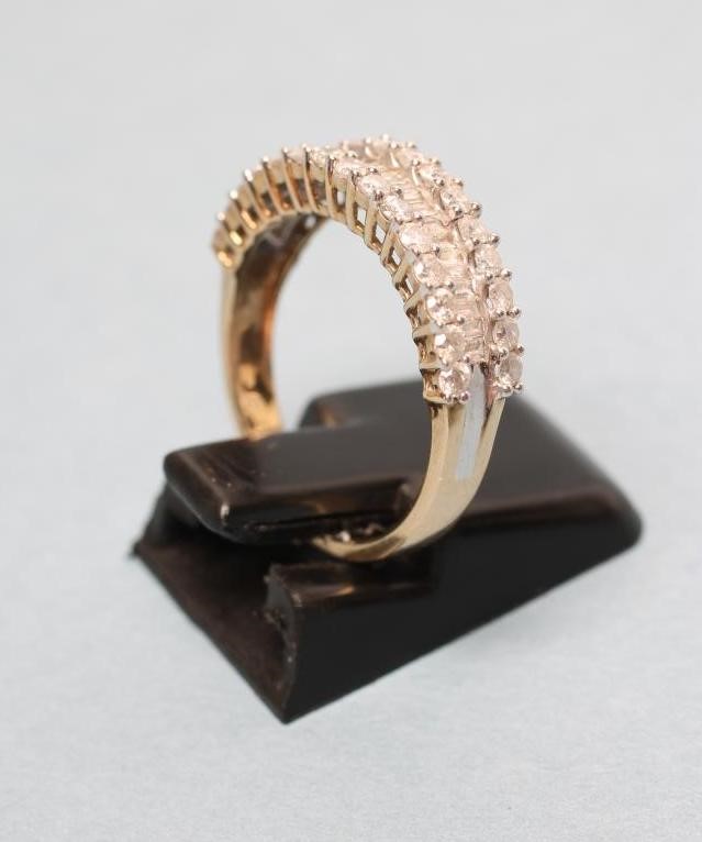 A DIAMOND HALF HOOP ETERNITY RING Image