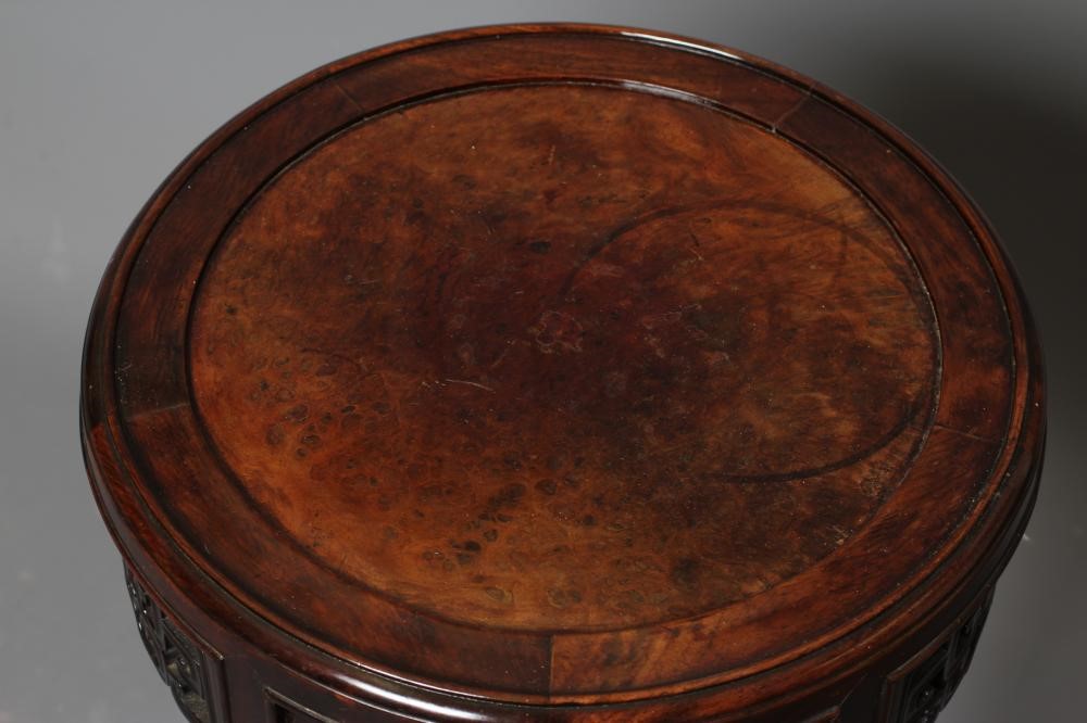 AN ORIENTAL HARDWOOD JARDINIERE STAND Image