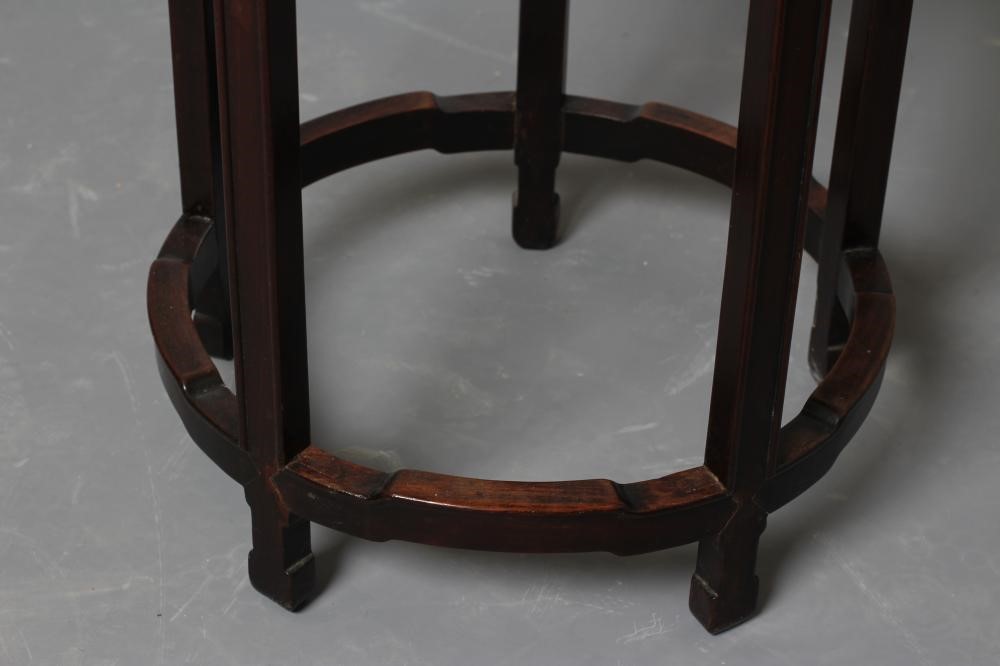 AN ORIENTAL HARDWOOD JARDINIERE STAND Image