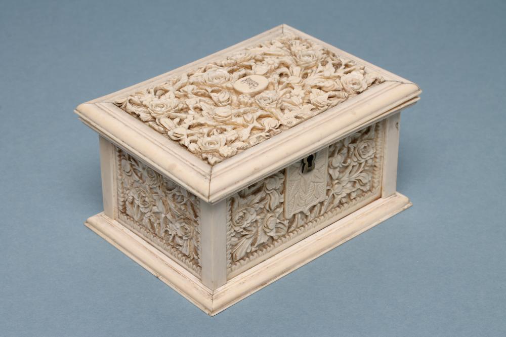AN IVORY CASKET of plain oblong form Image