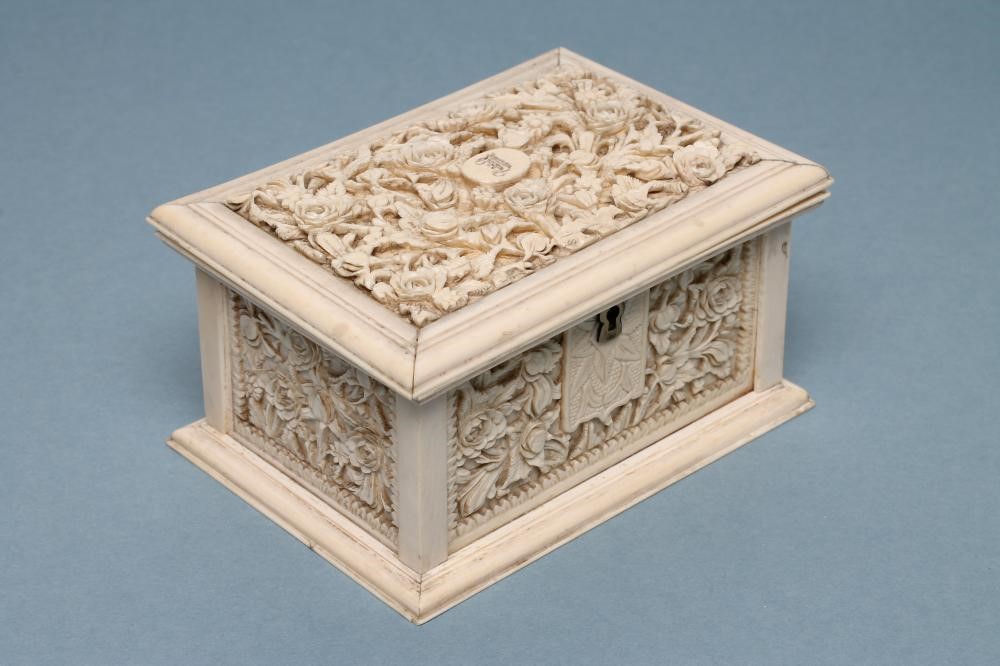 AN IVORY CASKET of plain oblong form Image
