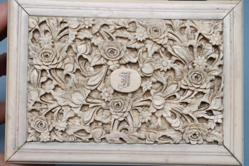 AN IVORY CASKET of plain oblong form Image