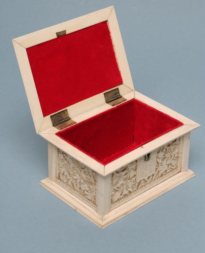 AN IVORY CASKET of plain oblong form Image