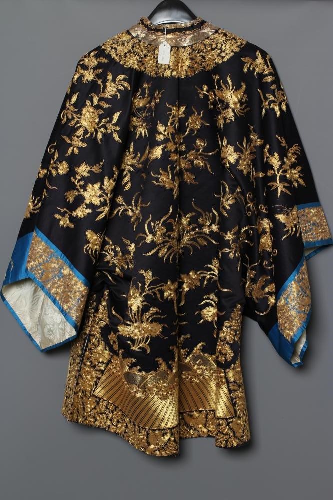 A CHINESE BLACK SILK COAT Image