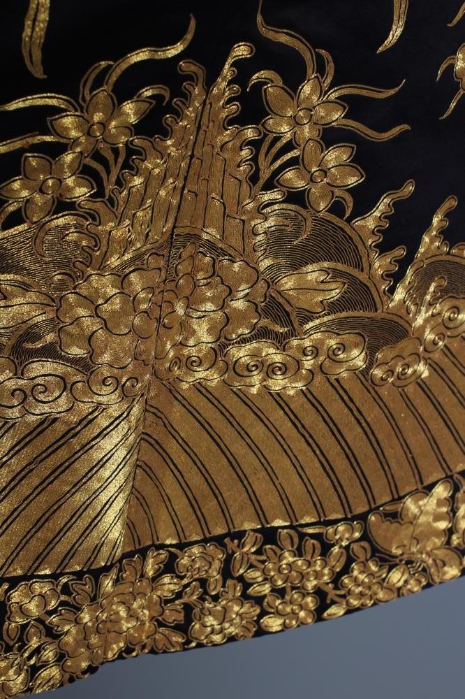 A CHINESE BLACK SILK COAT Image