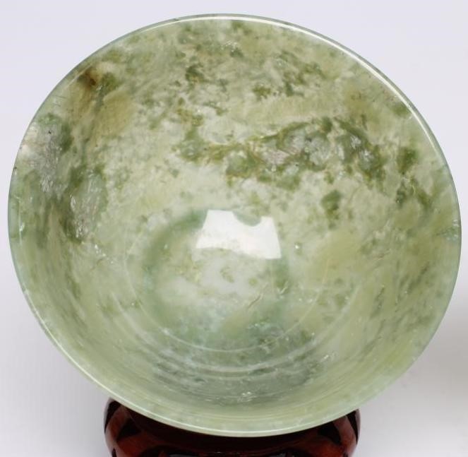 A PAIR OF TURNED AND POLISHED JADE BOWLS of plain circular form Image