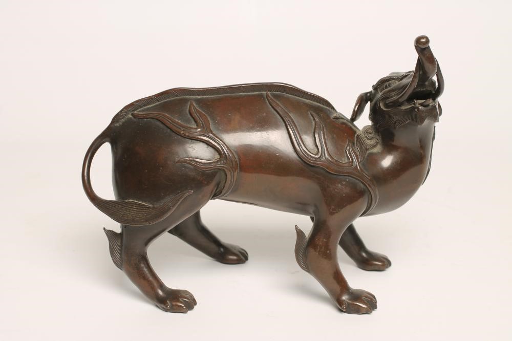 A JAPANESE BRONZE MYTHICAL BEAST Image