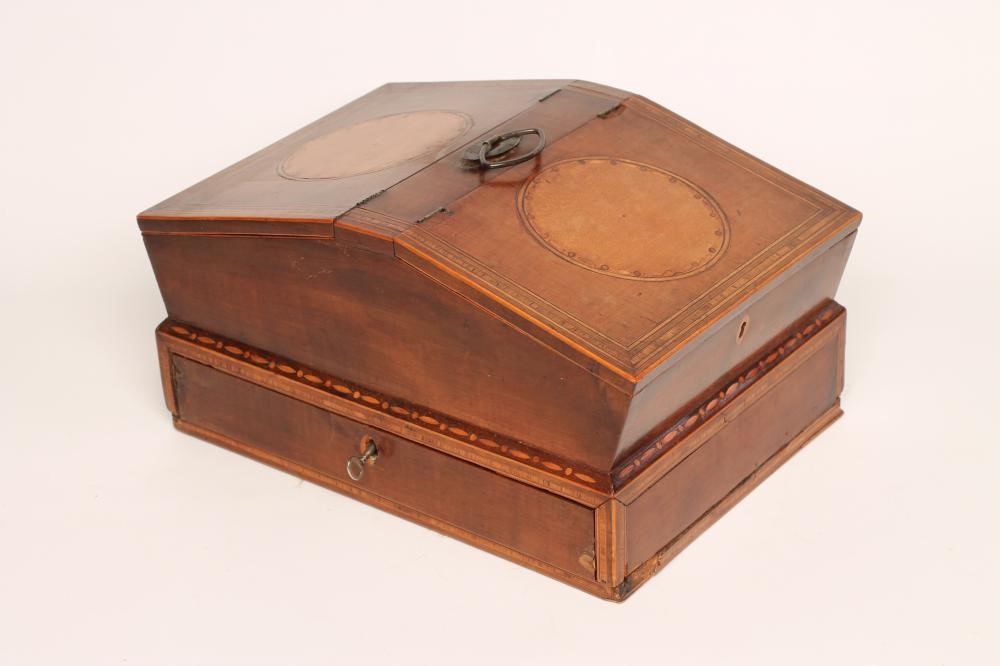 A REGENCY MAHOGANY AND CROSSBANDED WORKBOX Image