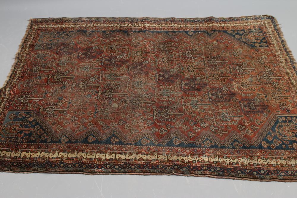 A PERSIAN TRIBAL RUG Image