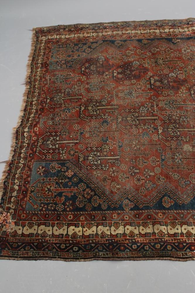 A PERSIAN TRIBAL RUG Image